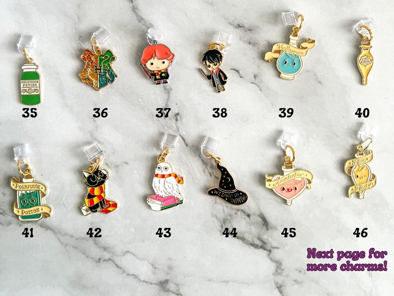 May include: A set of 11 Harry Potter themed charms, featuring characters, potions, and other magical items. The charms are made of metal and have a gold finish. The charms are numbered 35 through 46.