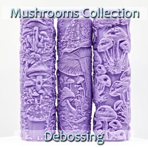 May include: Three purple rolling pins with different mushroom designs. The rolling pins are for use in baking and decorating. The text "Mushrooms Collection" and "Debossing" are visible in the image.