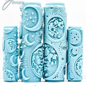 May include: A set of three ceramic mugs with a speckled, matte finish. The mugs are in shades of cream, light gray, and dark gray. Each mug has a simple, minimalist design and a rounded handle.