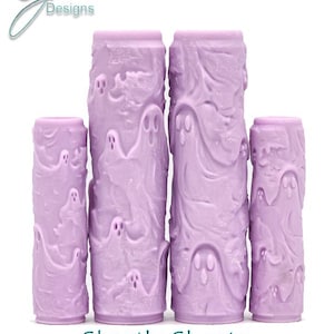 May include: Four purple rolling pins with a ghostly design. The rolling pins are different sizes and have a textured surface. Ghastly Ghosts Intricate Texture.
