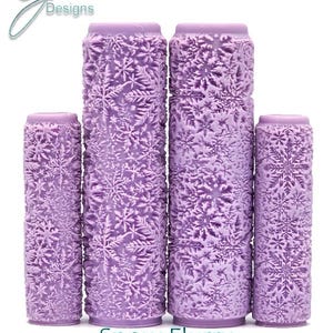 May include: Four purple paint rollers with a snowflake pattern. The rollers are labeled "Snow Flurry Intricate Texture".