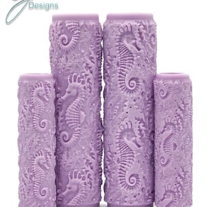 May include: Four purple textured rolling pins with a seahorse and seashell design.  The rolling pins are different sizes.  Seahorses Intricate Texture.
