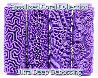 May include: Four purple textured paint rollers with the text "Fossilised Coral Collection Ultra Deep Debossing". The rollers feature different designs of fossilised coral.