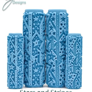 May include: Four blue paint rollers with a stars and stripes pattern. The rollers are different sizes and have a deep texture. The text "Stars and Stripes Deep Texture" is below the rollers.