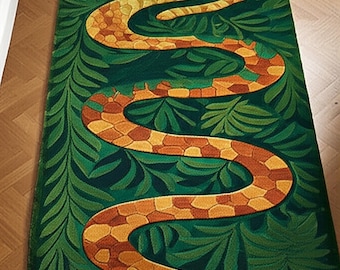 May include: A rectangular rug featuring a stylized snake design. The snake is depicted in shades of orange, yellow, and brown, winding across a dark green background filled with leafy patterns. The rug's design is reminiscent of Art Nouveau.