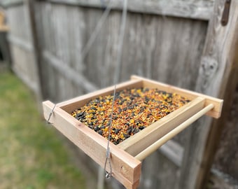 Hand made hanging bird feeder tray with drainage screen