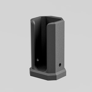 May include: A dark gray, geometric-shaped holder with a textured surface. The holder has a rectangular opening and two circular holes. The design is modern and minimalist.