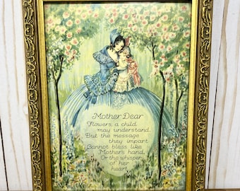 May include: A framed print with a vintage illustration of a mother and child in a garden setting. The print features a poem that reads "Mother Dear, Flowers, a child may understand, But the message they impart Cannot bless like Mother's hand, Or the whisper of her heart." The poem is signed "Mary Gold."