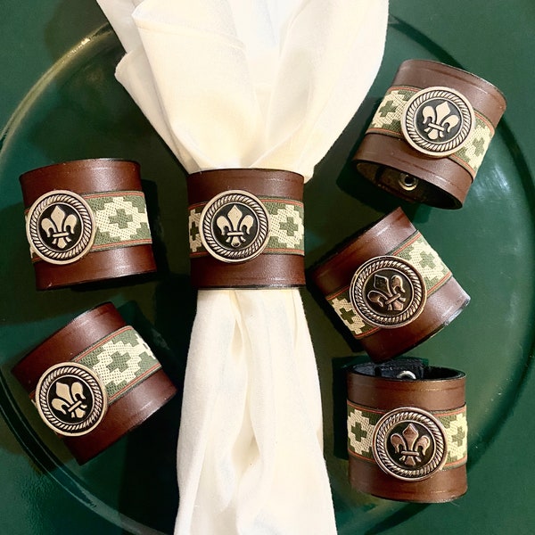 Vintage Brown Leather Napkin Rings with Fleur de Lis Metal Medallion Embellishment on Green Woven Cloth Set of 6
