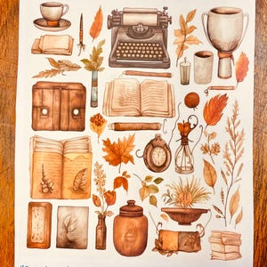 May include: A sticker sheet titled Vintage Antique Planner Stickers featuring illustrations of a typewriter, open books, a pocket watch, a trophy, autumn leaves, dried flowers, a leather satchel, and a jar. The bottom text reads JKiser.LuvinbyJessica.etsy All about the HOme!