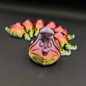 Top #1 Seller - Alice in Wonderland Cheshire style Caterpillar fidget toy