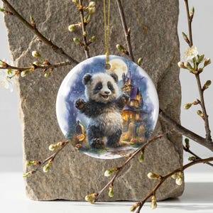 A panda bear standing on its hind legs, with a castle in the background, is the central focus of the image.