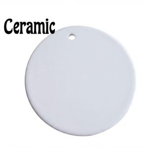 A white ceramic object with a hole in the center, labeled as "Ceramic".