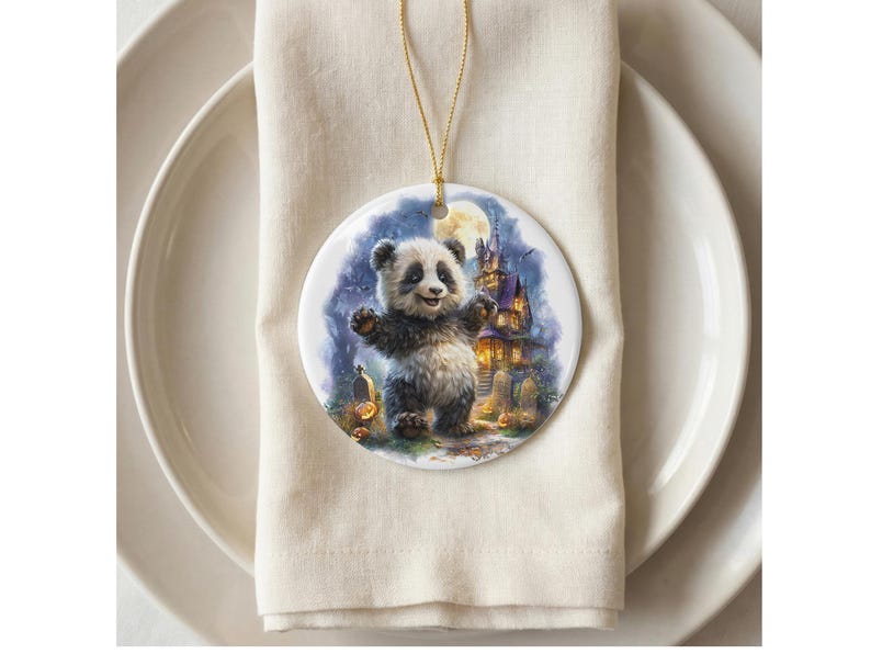 A panda bear standing on its hind legs with a castle in the background, as depicted on a decorative ornament hanging from a string.