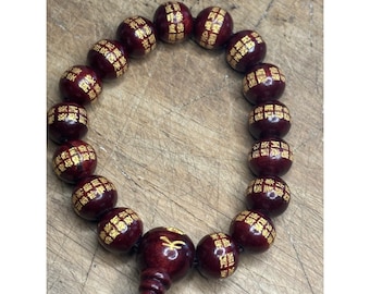 Handmade Buddhist Prayer Bead Bracelet With Red Wooden Beads & Gold Script Adjustable Cord Closure
