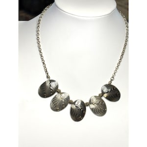 Silver-Tone Oval Pendant Necklace With Textured Design On Chain
