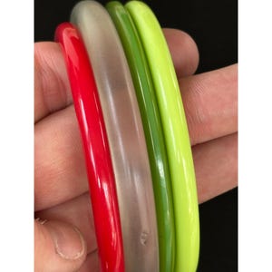 Set Of 4 Assorted Color Vintage Plastic Bangles
