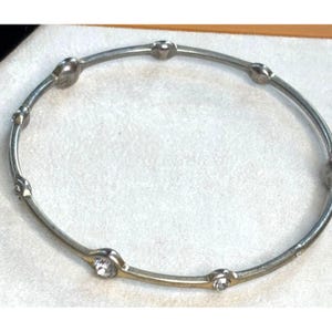 Lia Sophia Silver-Tone Lia Sophia Bangle Bracelet With Faux Diamond Accents
