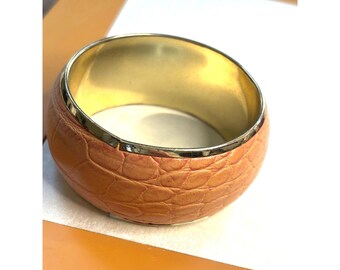 Gold-Tone Wide Bangle Bracelet With Faux Croc Embossed Orange Leather Design