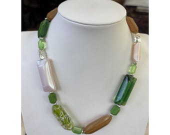 Multicolored Glass Bead Necklace With Green Brown  Pearl Tones Featuring Varied Shapes