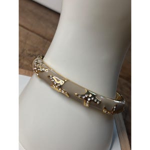 Joan Boyce signed Vintage  Gold-Tone & Cream Enamel Hinged Bangle With Rhinestone Accents
