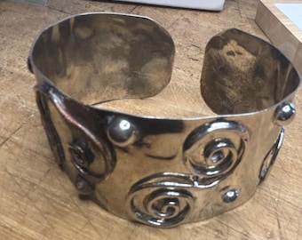 Handcrafted Silver-Toned Metal Cuff Bracelet With Swirl & Dot Pattern