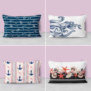 May include: Four decorative pillow covers with nautical themes. The first pillow cover features a blue and white pattern with seashells, anchors, and starfish. The second pillow cover features a white background with a blue octopus illustration. The third pillow cover features a white and red striped background with blue anchors. The fourth pillow cover features a black and white background with red starfish and seashells.