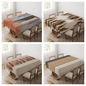 May include: Four different tablecloths featuring geometric patterns in shades of brown, beige, grey, and blue. The tablecloths are displayed on wooden tables with chairs.