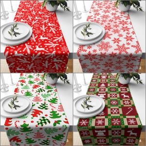 May include: A set of four Christmas-themed table runners. Designs include red and white patterns with snowflakes, reindeer, and Christmas trees. Each runner is rectangular and features festive holiday motifs.