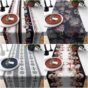 May include: Four different table runners with nautical and beach themes. The runners feature various designs, including seashells, anchors, stripes, and coral.