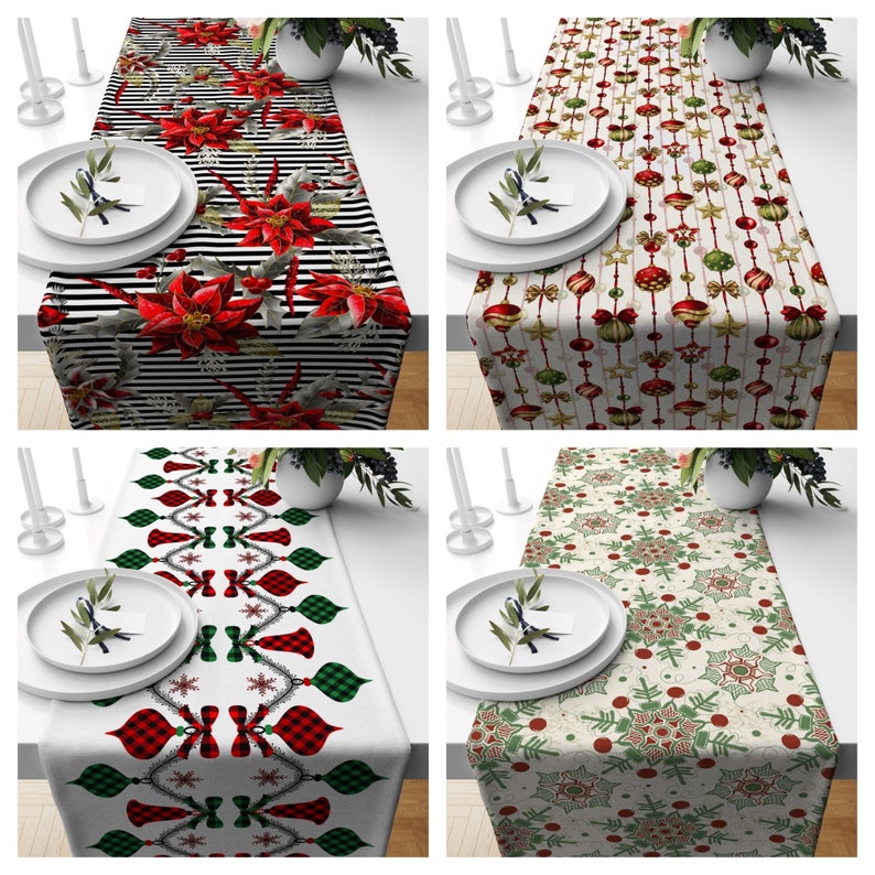May include: Four different Christmas table runners with various designs. The first runner features a red and white striped background with poinsettia flowers. The second runner has a white background with red and green ornaments. The third runner has a white background with red and green plaid bows and snowflakes. The fourth runner has a cream background with green and red snowflakes.
