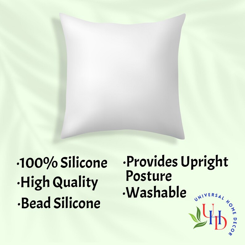 May include: A white pillow with a soft, plush texture. The pillow is made of 100% silicone and is designed to provide upright posture. It is also washable. The pillow is on a light green background with the text "100% Silicone", "High Quality", "Bead Silicone", "Provides Upright Posture", "Washable", and a logo that says "Universal Home Decor".