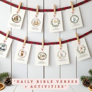 May include: Eight illustrated cards, each clipped to a red and green tartan ribbon with wooden pegs. The cards display religious scenes within circular frames. The text on the cards reads "DAILY BIBLE VERSES + ACTIVITIES".