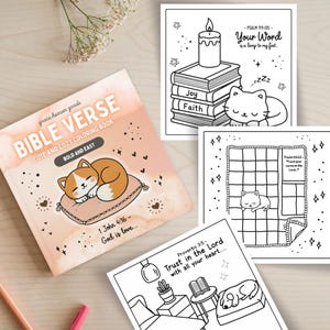 May include: A coloring book with a pink cover featuring a cat sleeping on a pillow. The cover text reads "Bible Verse Cute and Cozy Coloring Book Bold and Easy". The book includes illustrations of cats, candles, and books with Bible verses.