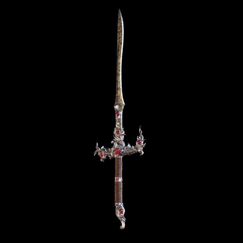 May include: A silver sword with a brown leather grip and red gemstone accents. The sword has a decorative design with intricate details.