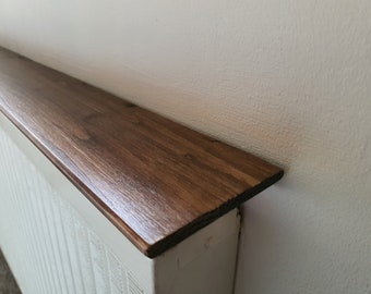 Radiator shelf made from Natural wood.