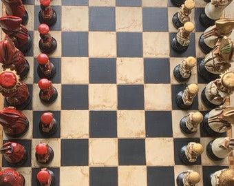 Vintage wooden chessboard and pieces