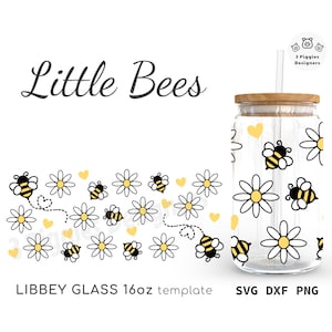 May include: A 16 oz. clear glass tumbler with a wooden lid and a straw. The tumbler is decorated with a pattern of yellow daisies and black bees. The text "Little Bees" is at the top of the image. The text "LIBBEY GLASS 16oz template SVG DXF PNG" is at the bottom of the image.
