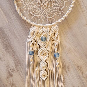 Doily dreamcatcher wall hanging