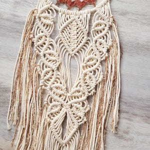 Crochet dreamcatcher-style wall hanging, earth-toned