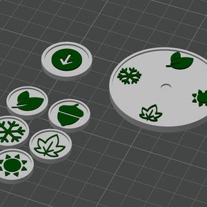 May include: A collection of grey seasonal tokens with green icons, such as a snowflake, leaf, acorn, and sun. A larger grey disc displays similar green seasonal icons. The tokens and disc are set against a grey grid background.