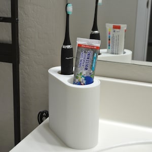 Sleek Single AquaSonic Black and Vibe Series Electric Toothbrush Stand with Toothpaste Holder - Bathroom Accessory