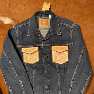 Blue Jean jacket with custom leather pockets.