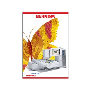 May include: A white Bernina artista 730 embroidery machine with a large hoop and a colorful butterfly design on the screen. The machine is on a white surface with a red and white Bernina logo.