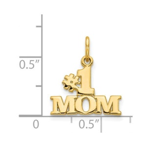 May include: Gold-tone pendant charm with the words "#1 MOM" in a bold, blocky font. The pendant is approximately 0.5 inches in size.
