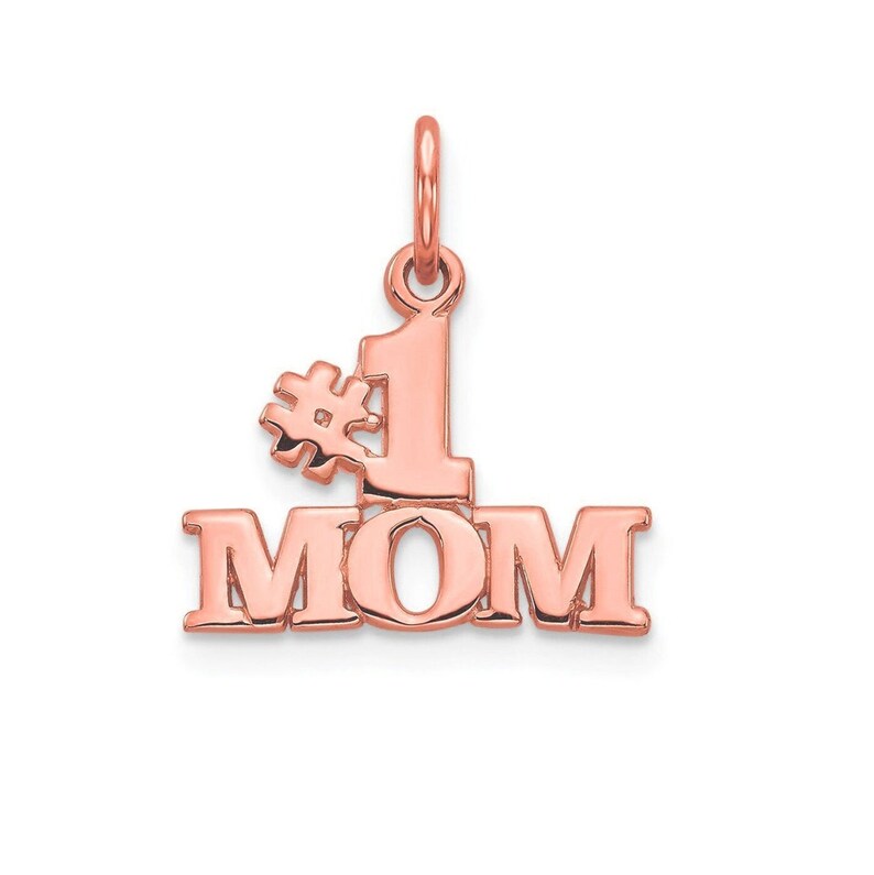 May include: Rose gold pendant charm with the words "#1 MOM" in a bold font.