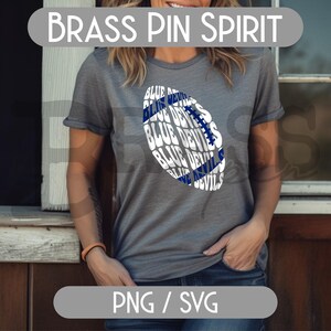 May include: A gray t-shirt with a football graphic that says "Blue Devils" in white and blue. The shirt has rolled-up sleeves and the text "Brass Pin Spirit" at the top.