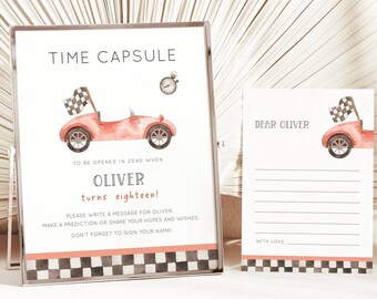 Könnte beinhalten: Ein Zeitkapsel-Schild mit einem roten Rennwagen und einem karierten Flaggen-Design. Das Schild lautet "Time Capsule" und "To be opened in 2040 when Oliver turns eighteen!"  Bitte schreibe eine Nachricht für Oliver, mache eine Vorhersage oder teile deine Hoffnungen und Wünsche. Vergiss nicht, deinen Namen zu unterschreiben!"