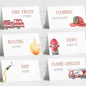 May include: Set of six white tent cards with watercolor illustrations and text. Cards include a fire truck, firefighter helmet, flame, fire hydrant, fire hose, and a fire truck with a ladder. Text includes "Fire Truck Tires", "Flaming Cupcakes", "Blazing Chips", "Fiery Fruits", "Fire Hose", and "Flame-Grilled Wings".