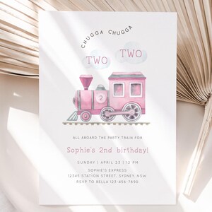 May include: Pink train invitation with the text "CHUGGA CHUGGA TWO TWO" and "All aboard the party train for Sophie's 2nd birthday!"  The invitation also includes the date, time, address, and RSVP information.